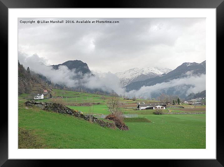 Rolling mist in the Swiss Alps.  Framed Mounted Print by Lilian Marshall