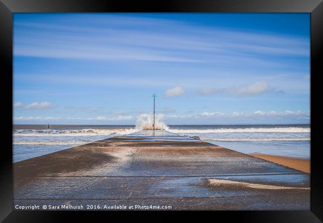 Waves crashing Framed Print by Sara Melhuish