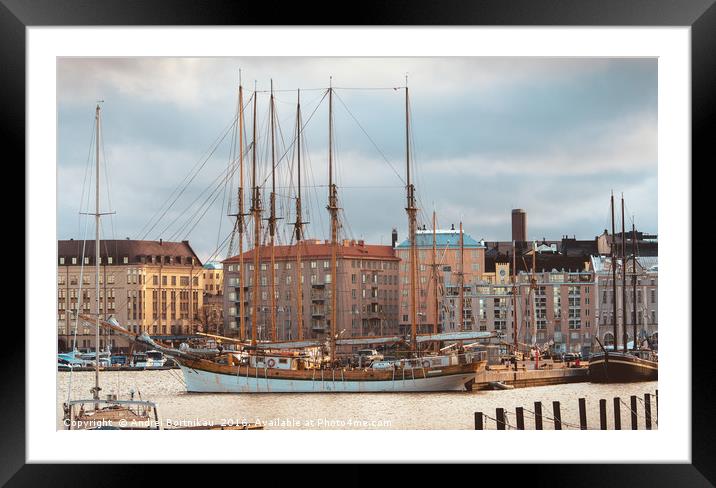 Sailboat moored in North Harbour in Helsinki Framed Mounted Print by Andrei Bortnikau