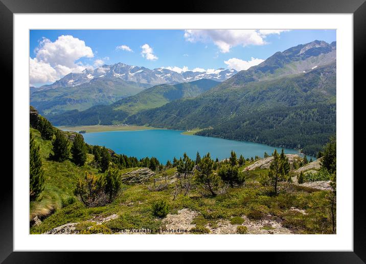 Mountains and lake in the Swiss Alps. Framed Mounted Print by Sergey Fedoskin