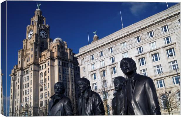 Beatles Statue and Liver Building                  Canvas Print by Darren Galpin