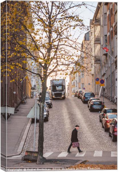 Businessman rushing across the road in a hurry. Canvas Print by Andrei Bortnikau