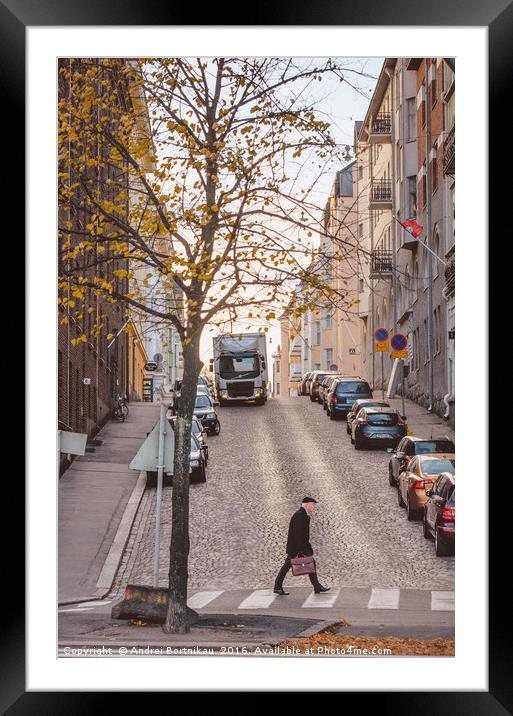 Businessman rushing across the road in a hurry. Framed Mounted Print by Andrei Bortnikau