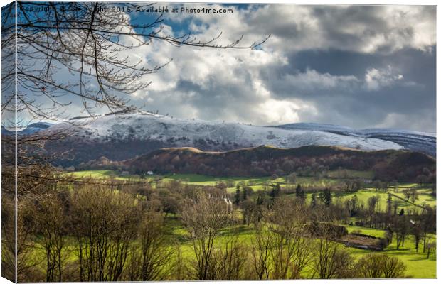 Spring Snow in Wales Canvas Print by Sue Knight