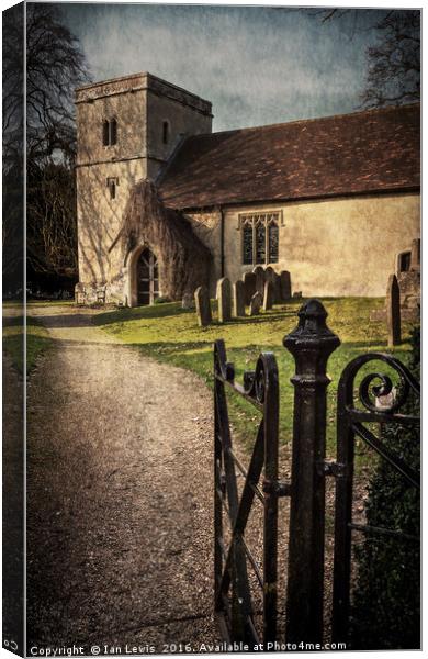 Ancient Norman Church in a Peaceful Village Canvas Print by Ian Lewis