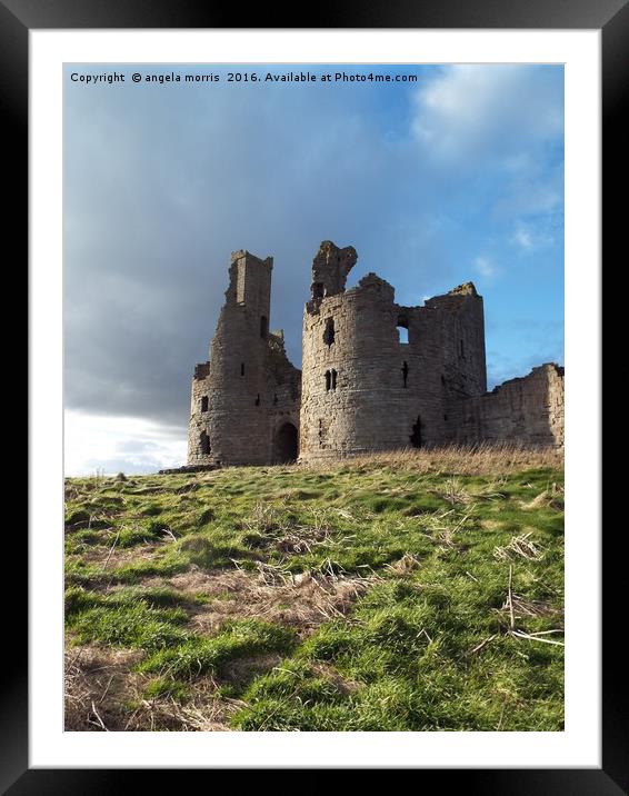 Dunstanburgh Castle Framed Mounted Print by angela morris