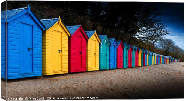 Beach Huts Canvas Print by Mike Janik