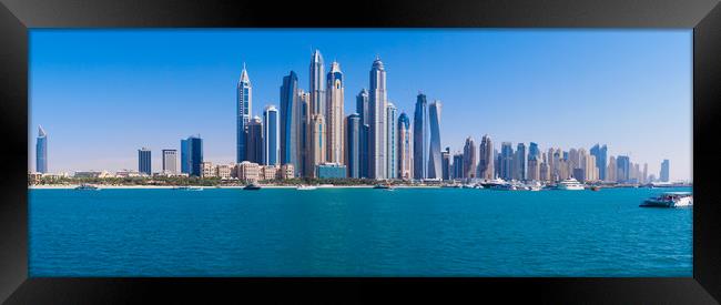 Dubai Marina Skyline. Framed Print by Tommy Dickson