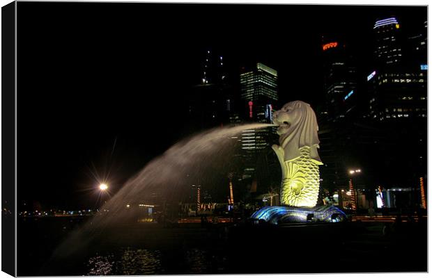 Merlion sculpture in Singapore at night Canvas Print by Douglas Kerr