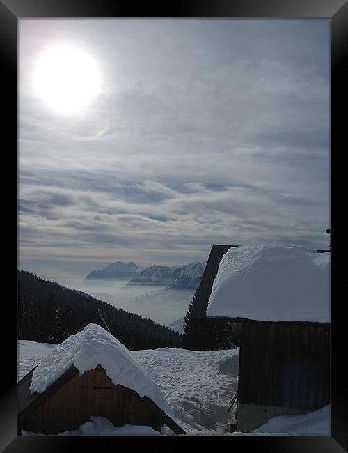 Crest-Voland France, sunny day above the clouds. Framed Print by Ian Small