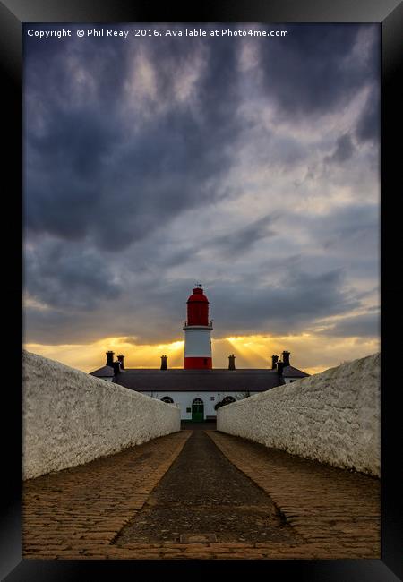 Shafts of light at Souter Framed Print by Phil Reay
