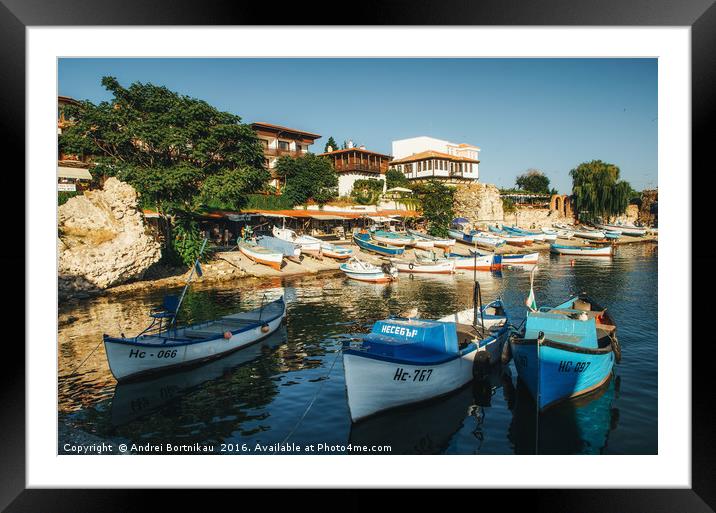 Old wooden fishing boat in a port of Nessebar Framed Mounted Print by Andrei Bortnikau