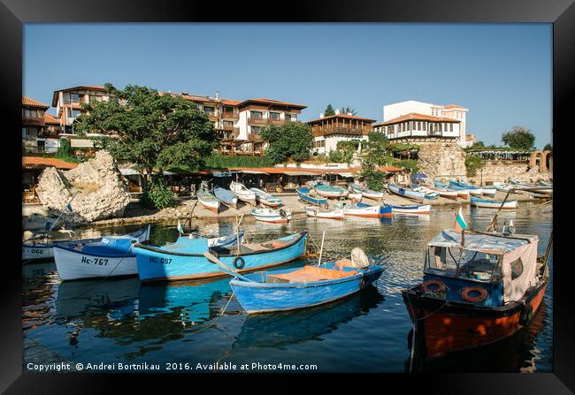 Old wooden fishing boats in a port of Nessebar Framed Print by Andrei Bortnikau