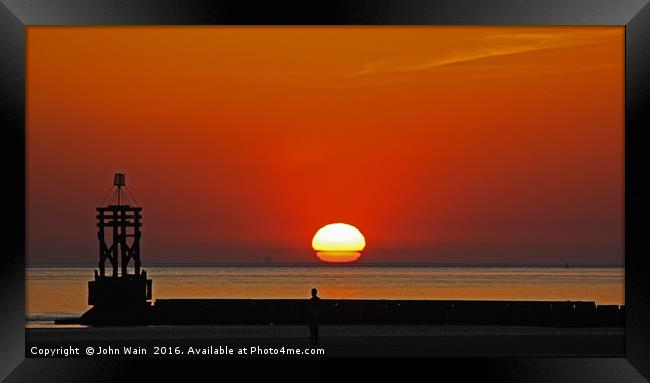 Another place Sunset Framed Print by John Wain