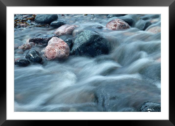 water over pebbles Framed Mounted Print by Michael Hopes