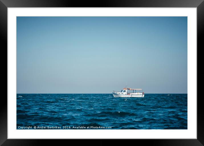 Lonely tourist boat in the Black Sea without peopl Framed Mounted Print by Andrei Bortnikau