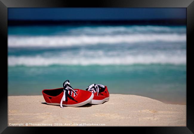 Red Sneakers at the Beach Framed Print by Thomas Herzog