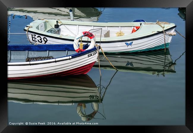 Small Skiffs - Lyme Regis Harbour Framed Print by Susie Peek
