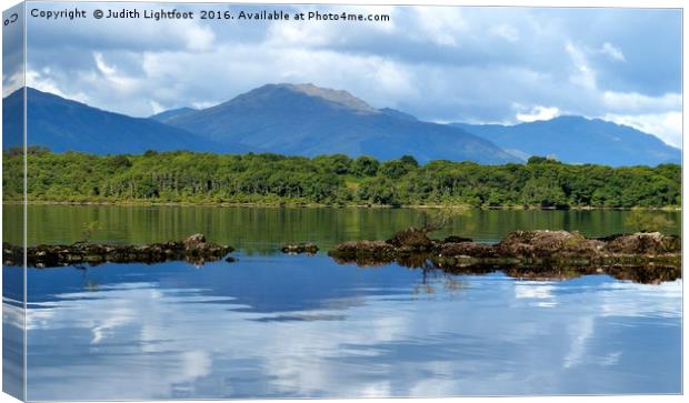 The tranquil Loch Lommond Canvas Print by Judith Lightfoot