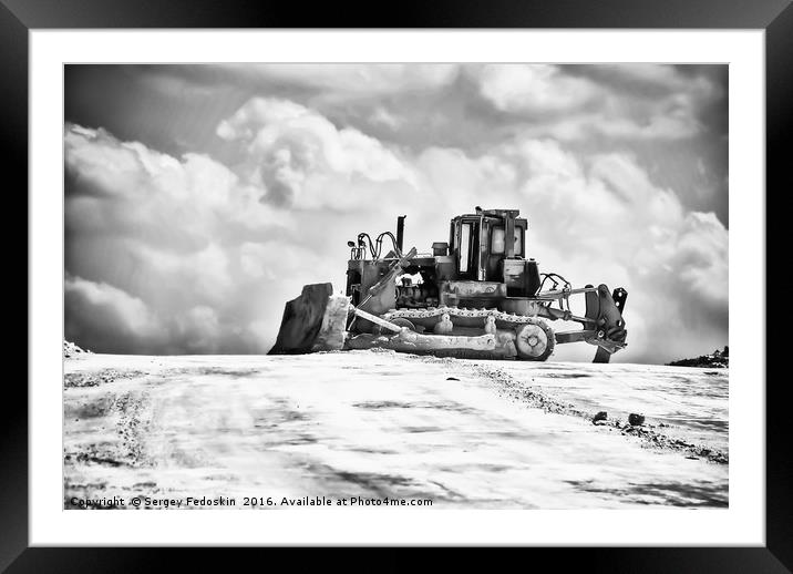 Tractor on the white mountain. Framed Mounted Print by Sergey Fedoskin