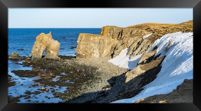 Húsavík and a  sea arch Icelandic Views Framed Print by Gail Johnson