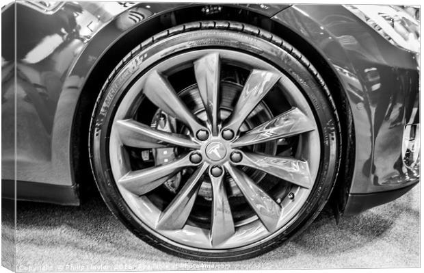 Close up monochrome photo of a Tesla electric car  Canvas Print by Naylor's Photography