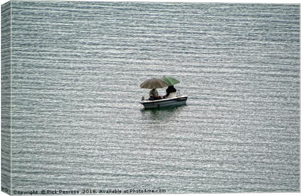 Fishing In The Rain Canvas Print by Rick Penrose