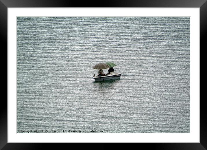 Fishing In The Rain Framed Mounted Print by Rick Penrose