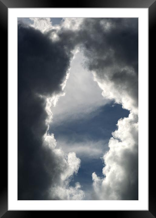 Clouds Through the Keyhole Framed Mounted Print by Chris Day