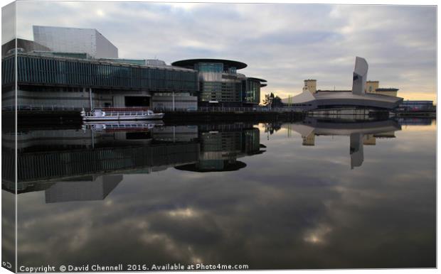 Salford Quays Reflection  Canvas Print by David Chennell