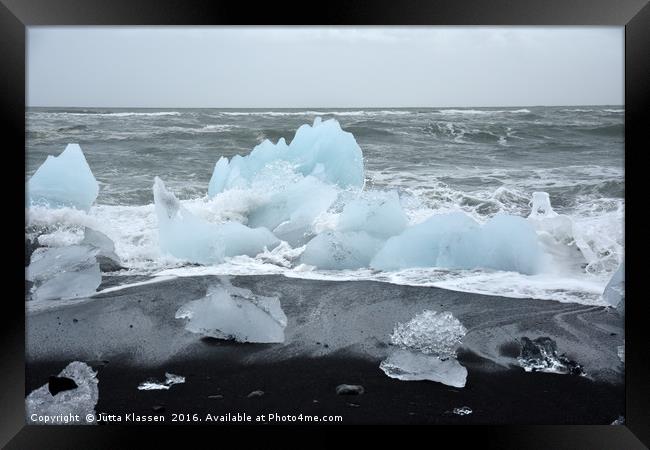 Glacier ice floes on a black beach Framed Print by Jutta Klassen