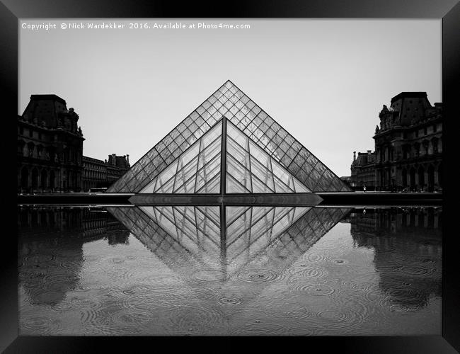 Louvre in the rain. Framed Print by Nick Wardekker
