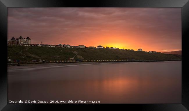 Sun setting over Whitby Seafront Framed Print by David Oxtaby  ARPS