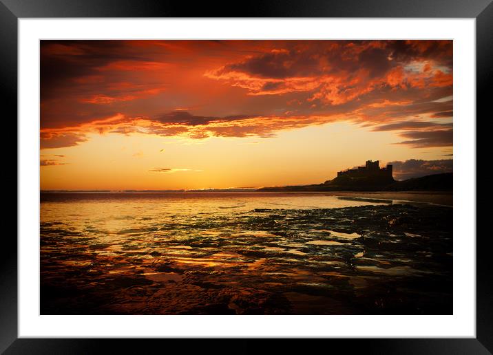 Bamburgh Castle Sunset Framed Mounted Print by J Biggadike