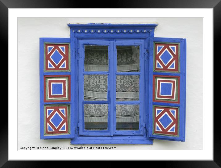 A Romanian Farmhouse Window with shutters Framed Mounted Print by Chris Langley