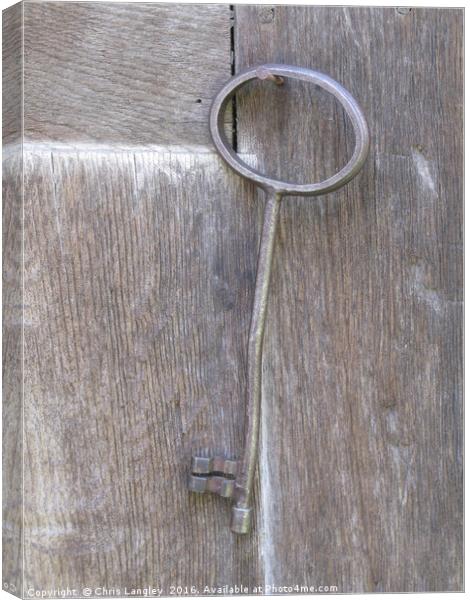 The Key to the Fortified Church, Apold, Romania Canvas Print by Chris Langley