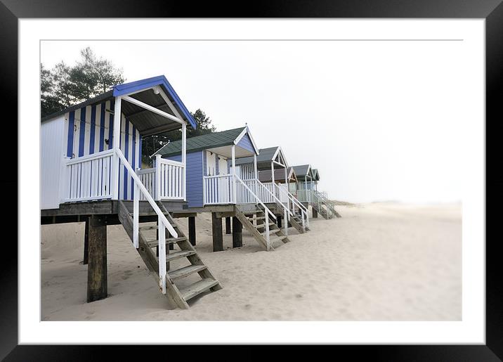 Faded beach huts at Wells Framed Mounted Print by Stephen Mole