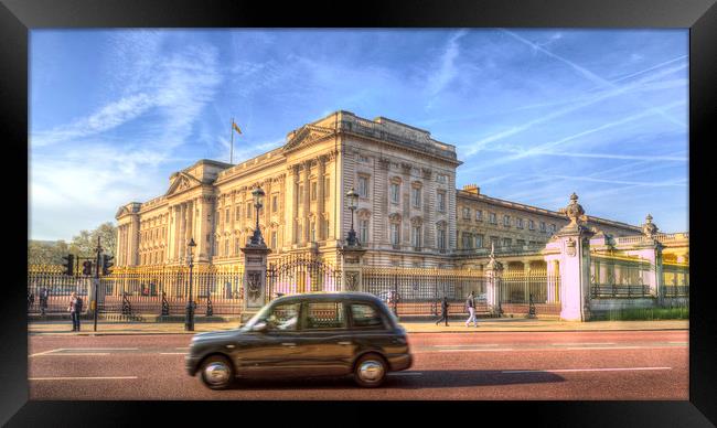 London Taxi And Buckingham Palace  Framed Print by David Pyatt