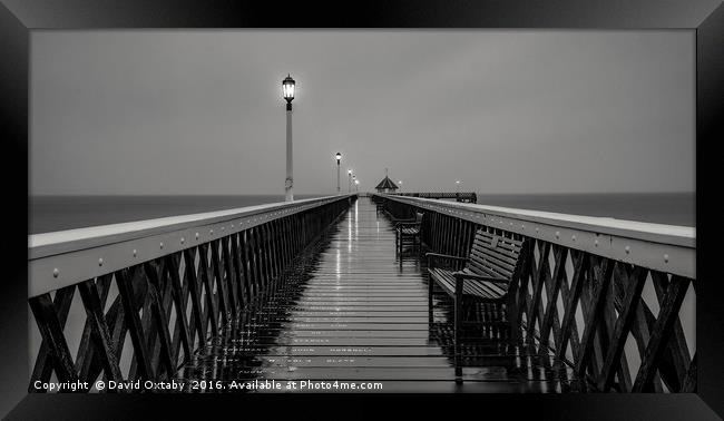 Wet evening at Yarmouth Pier Framed Print by David Oxtaby  ARPS