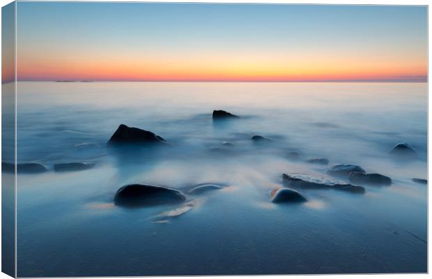 Pre-dawn colours at Embleton bay, Northumberland Canvas Print by Daugirdas Racys