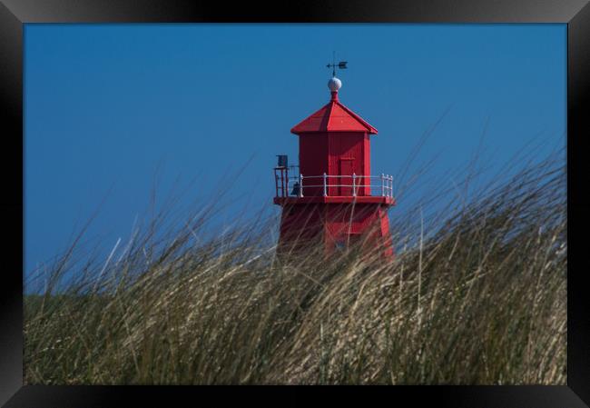 The Herd Groyne Lighthouse Framed Print by John Ellis