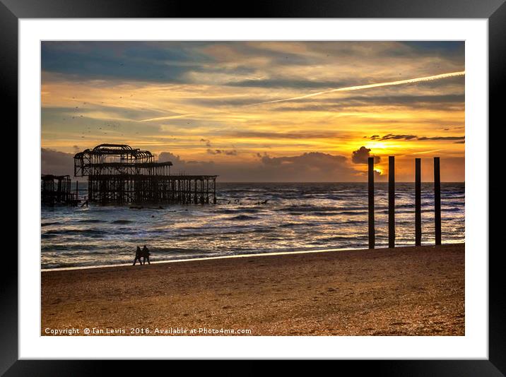 Sunset Over The West Pier Framed Mounted Print by Ian Lewis