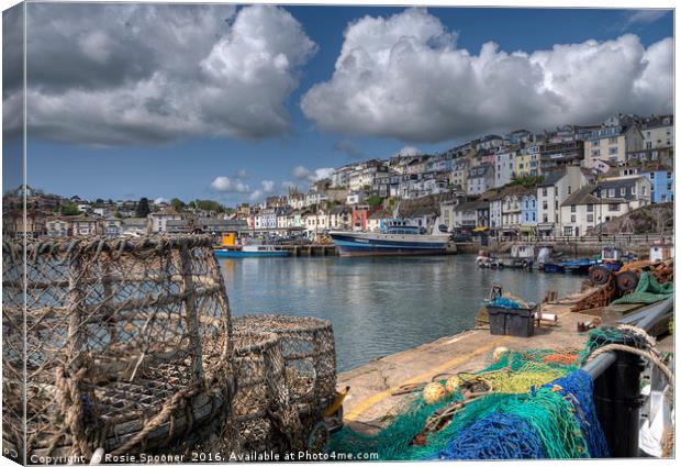 Lobster pots on the quay at Brixham Canvas Print by Rosie Spooner