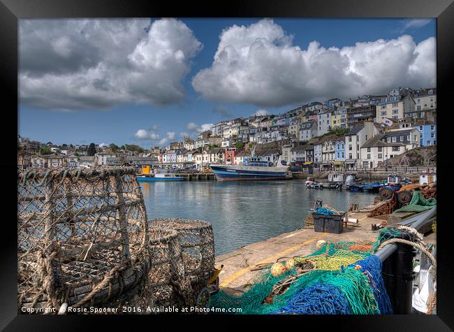 Lobster pots on the quay at Brixham Framed Print by Rosie Spooner
