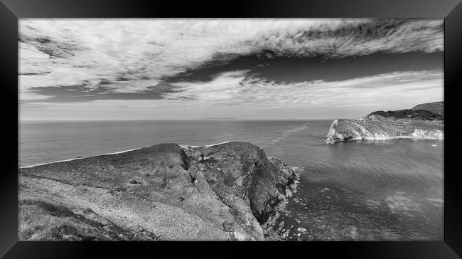 The entrance to Lulworth Cove in Monochrome.  Framed Print by Mark Godden