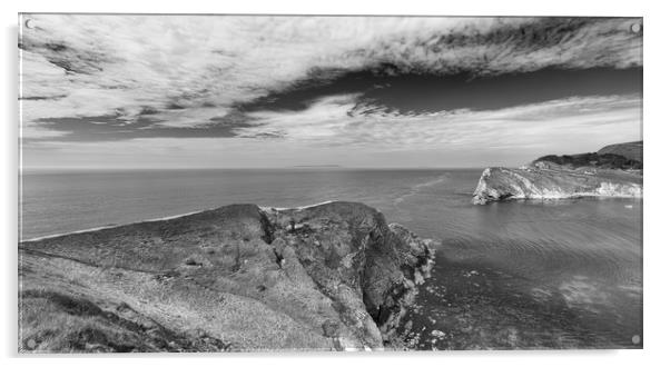 The entrance to Lulworth Cove in Monochrome.  Acrylic by Mark Godden