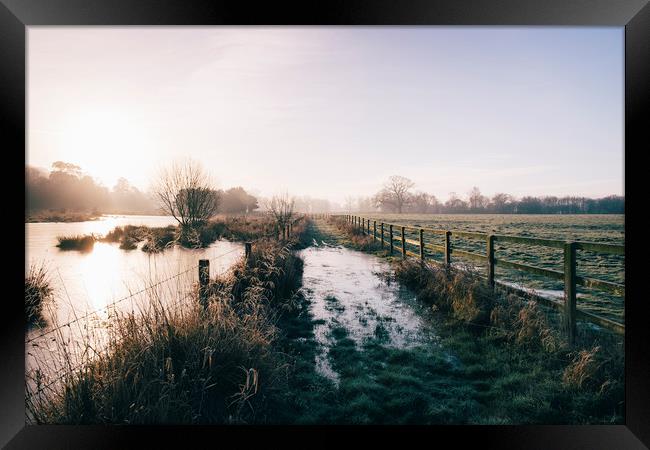 Track beside a fenced field on a frosty morning. H Framed Print by Liam Grant