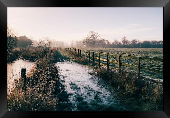 Track beside a fenced field on a frosty morning. H Framed Print by Liam Grant