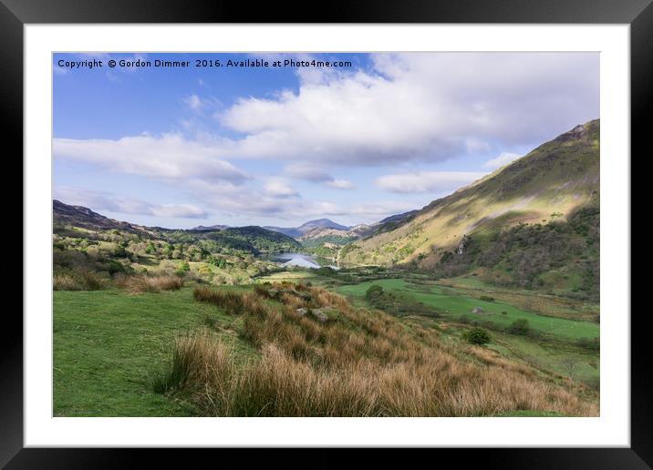 Mountains and a Lake in Snowdonia North Wales Framed Mounted Print by Gordon Dimmer