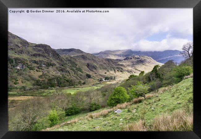 An early morning view of the mountains in snowdoni Framed Print by Gordon Dimmer